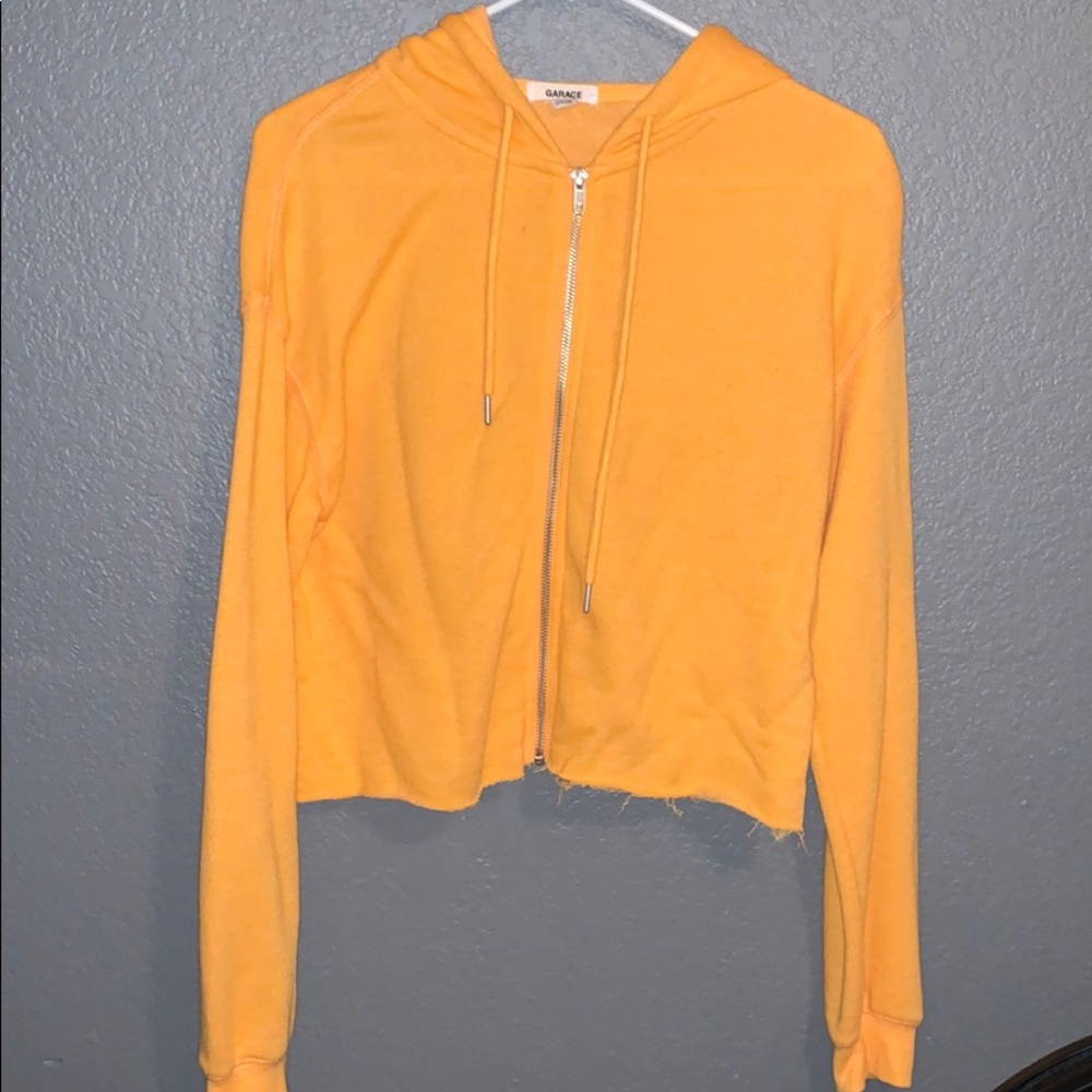 GARAGE orange cropped zip up